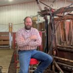 Eric Knock sitting by the cattle chute.